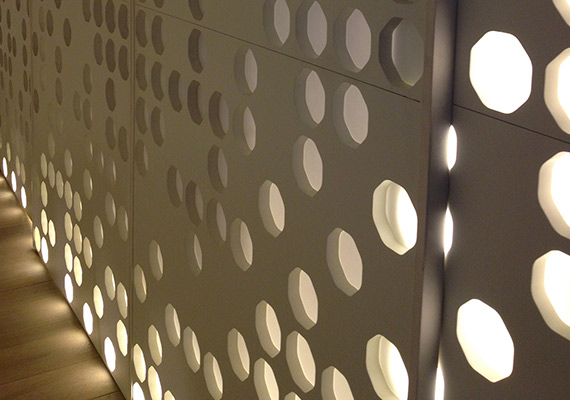 Panels own design, pantographed white powder coating. Back light. Store Oliva Lamps in Madrid..